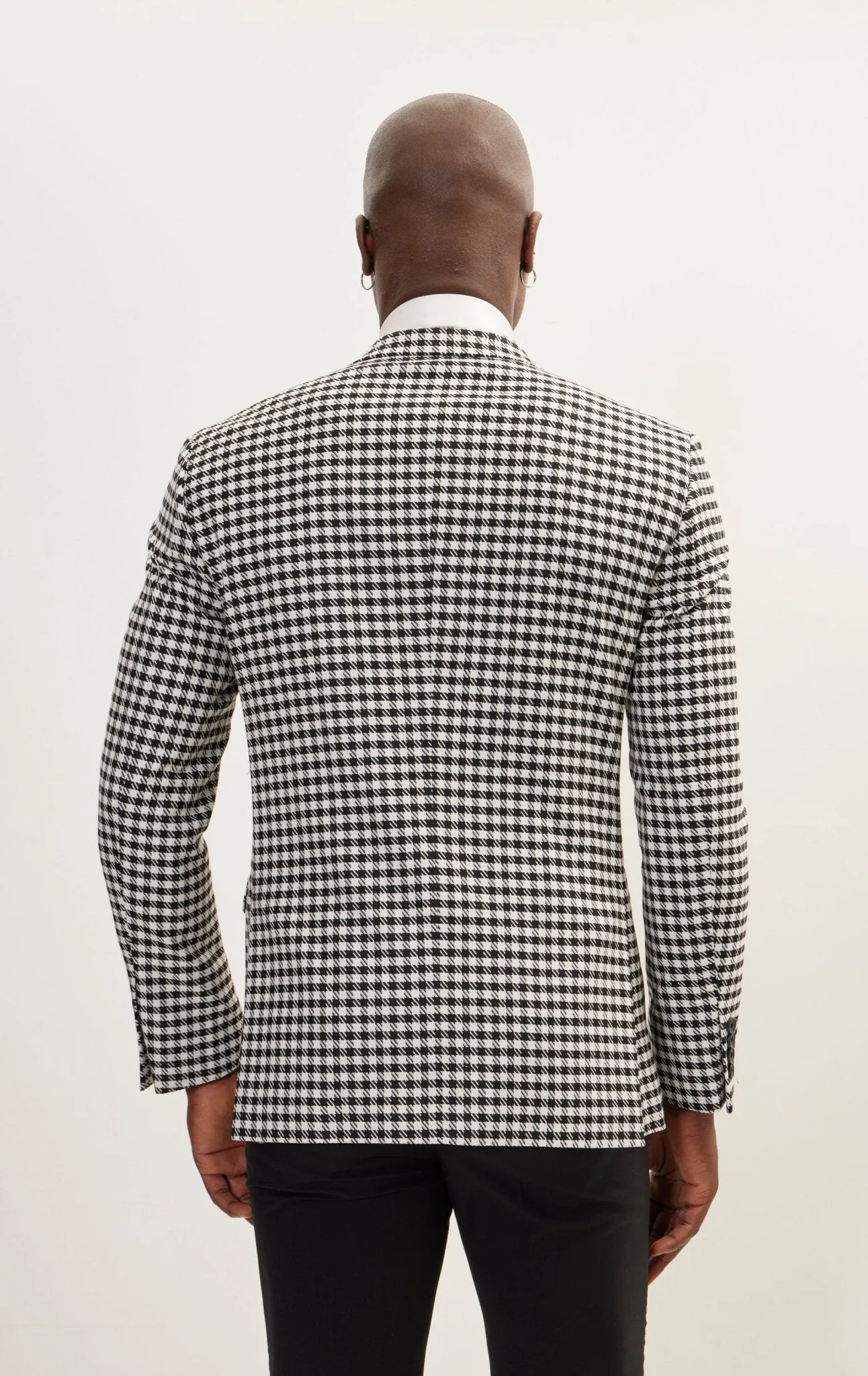 Double-Breasted Houndstooth Suit With Black Pants